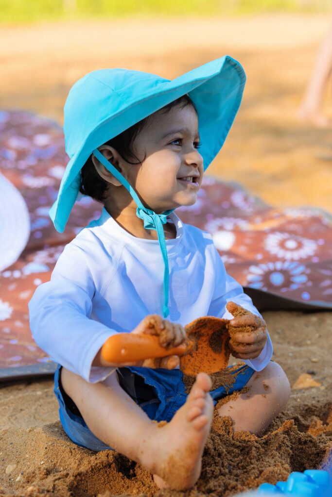 Wearing i play. Baby Brim Hat, Iplay toddler Rash Guard shirt