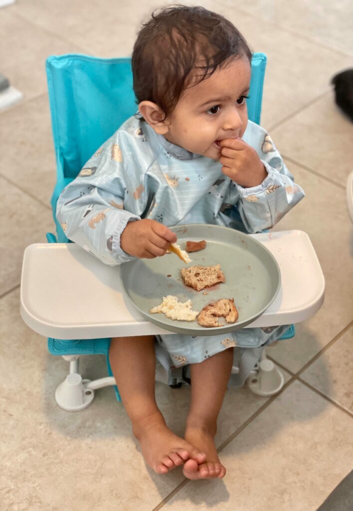 Toddler Summer Essentials by US top mom blogger Dreaming Loud- Portable high Chair