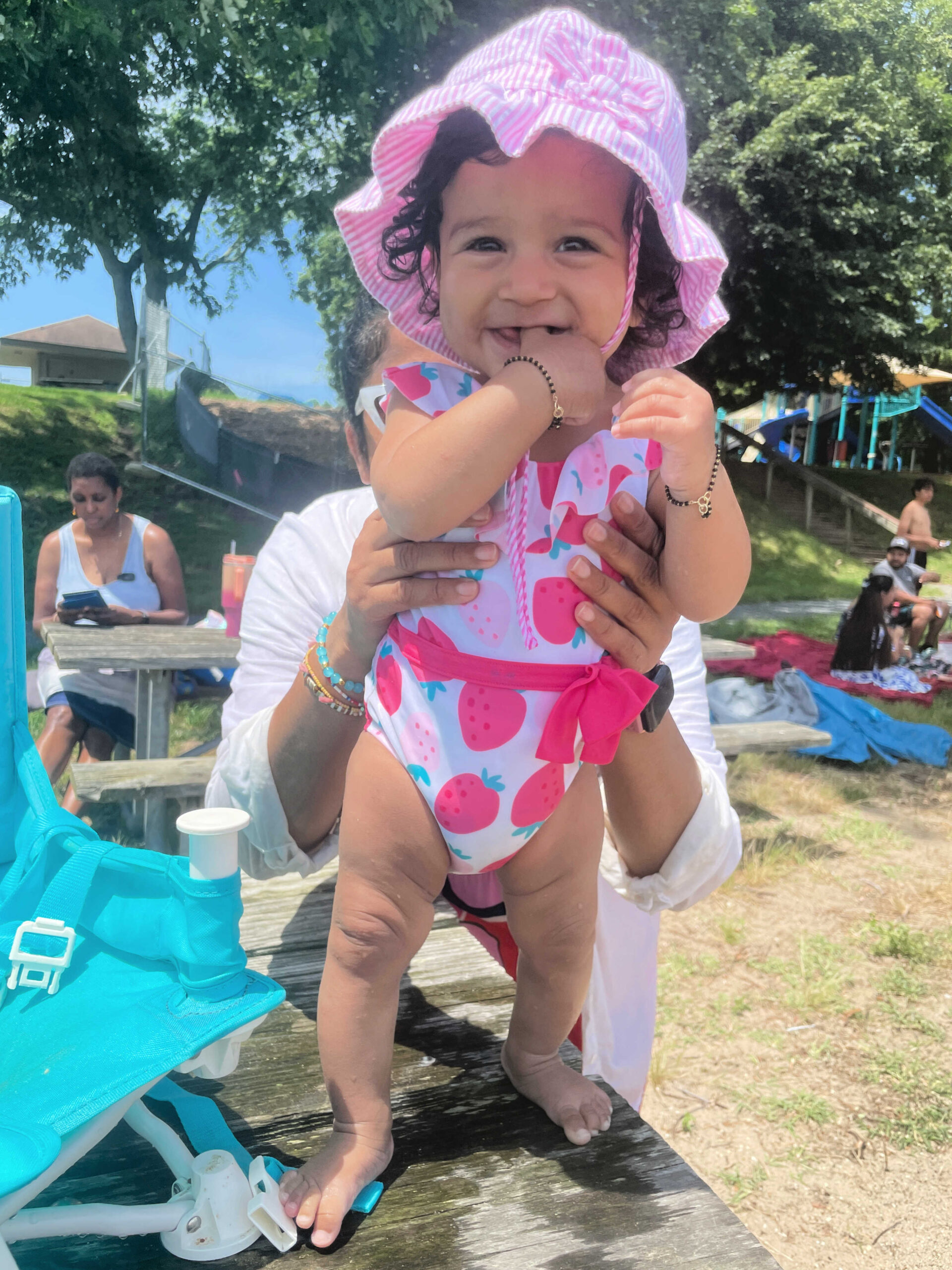 Baby Girl SPF swimwear-25 Toddler Summer and Beach Essentials - Jasonwell Splash Pad Sprinkler/ Play Mat by Top US mom Blogger Dreaming Loud