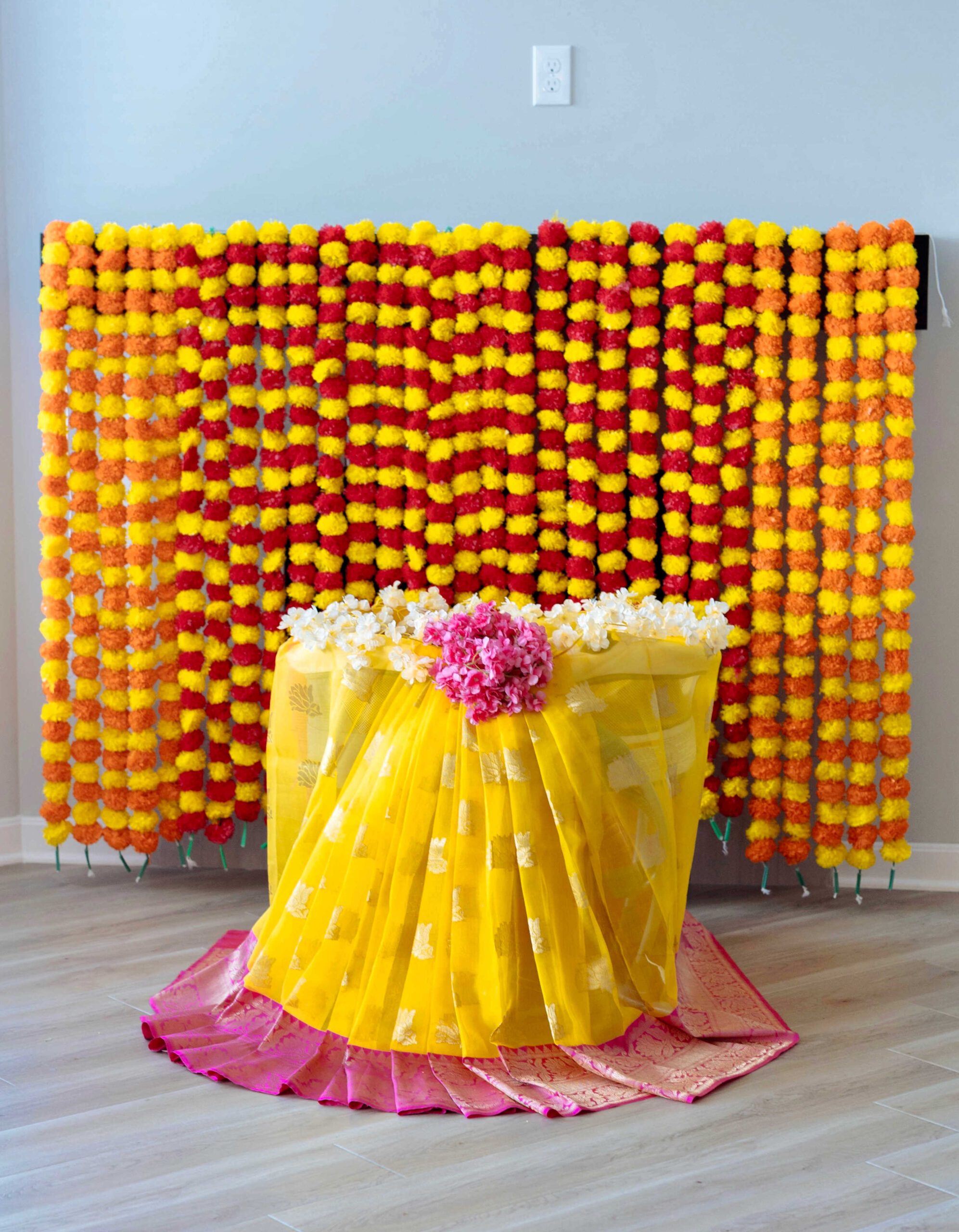 Simple Cradle Ceremony Decoration Ideas in the USA - cradle ceremony decor with a saree by Top US mom blogger Dreaming Loud