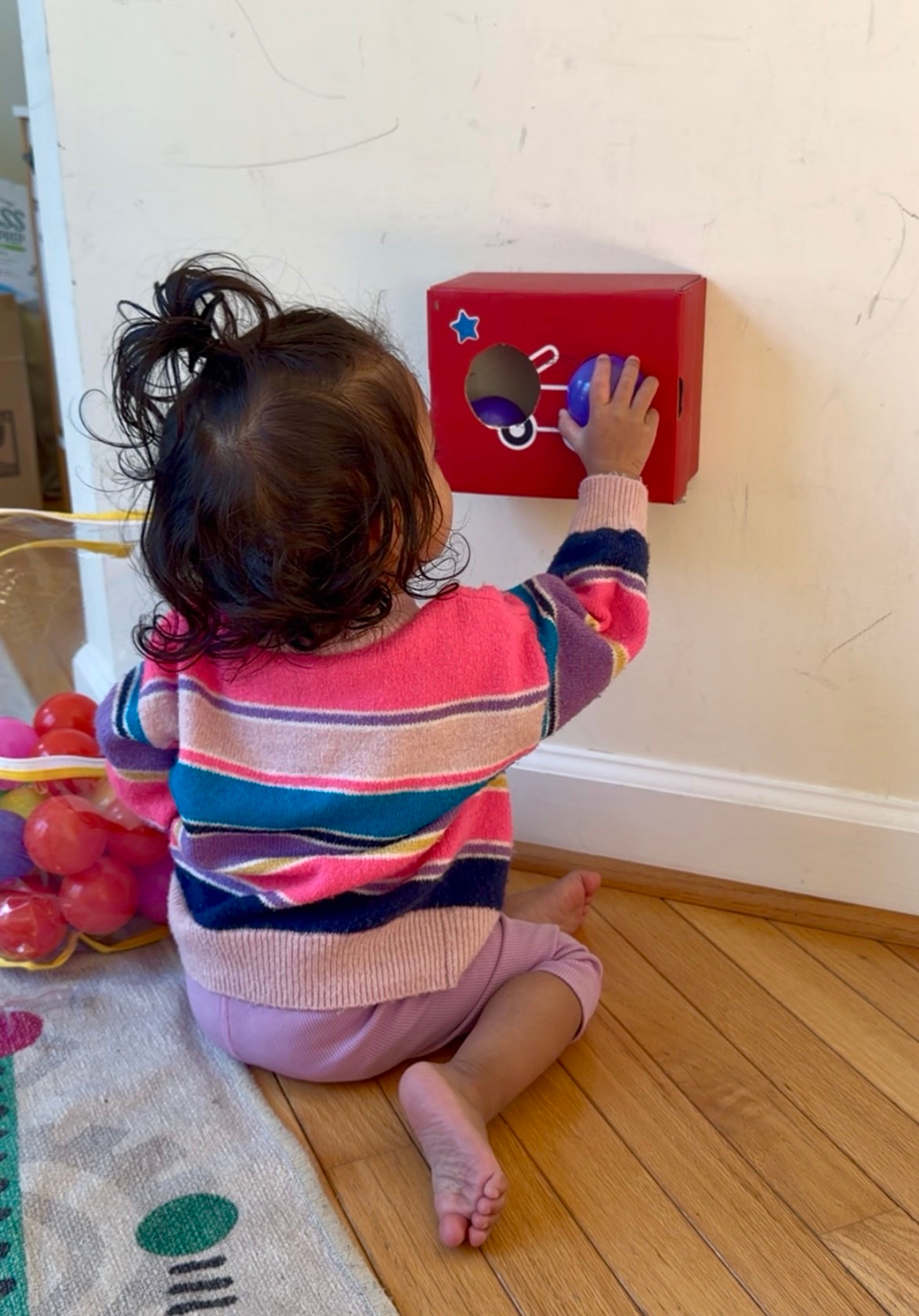 Amazing Baby Activities 6-12 Months Boost Development Through Play- Object Permanence Box by Top US Mom Blogger Dreaming Loud