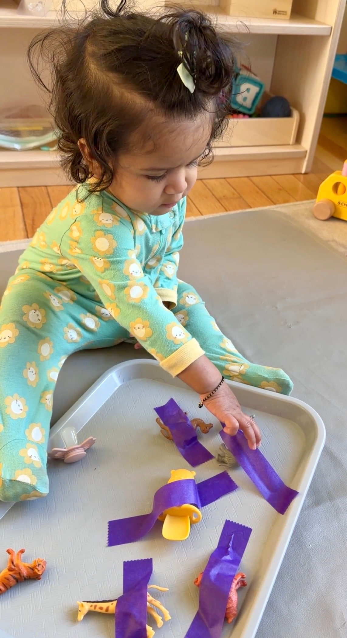 Amazing Baby Activities 6-12 Months Boost Development Through Play- Pincer grasp activities by Top US Mom Blogger Dreaming Loud