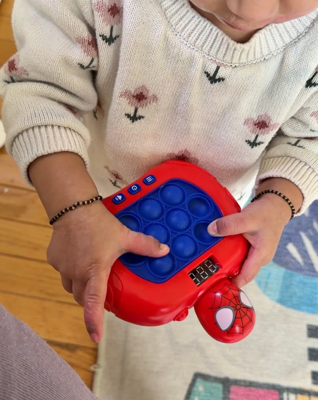 Amazing Baby Activities 6-12 Months Boost Development Through Play- Pop It Sensory Toy by Top US Mom Blogger Dreaming Loud