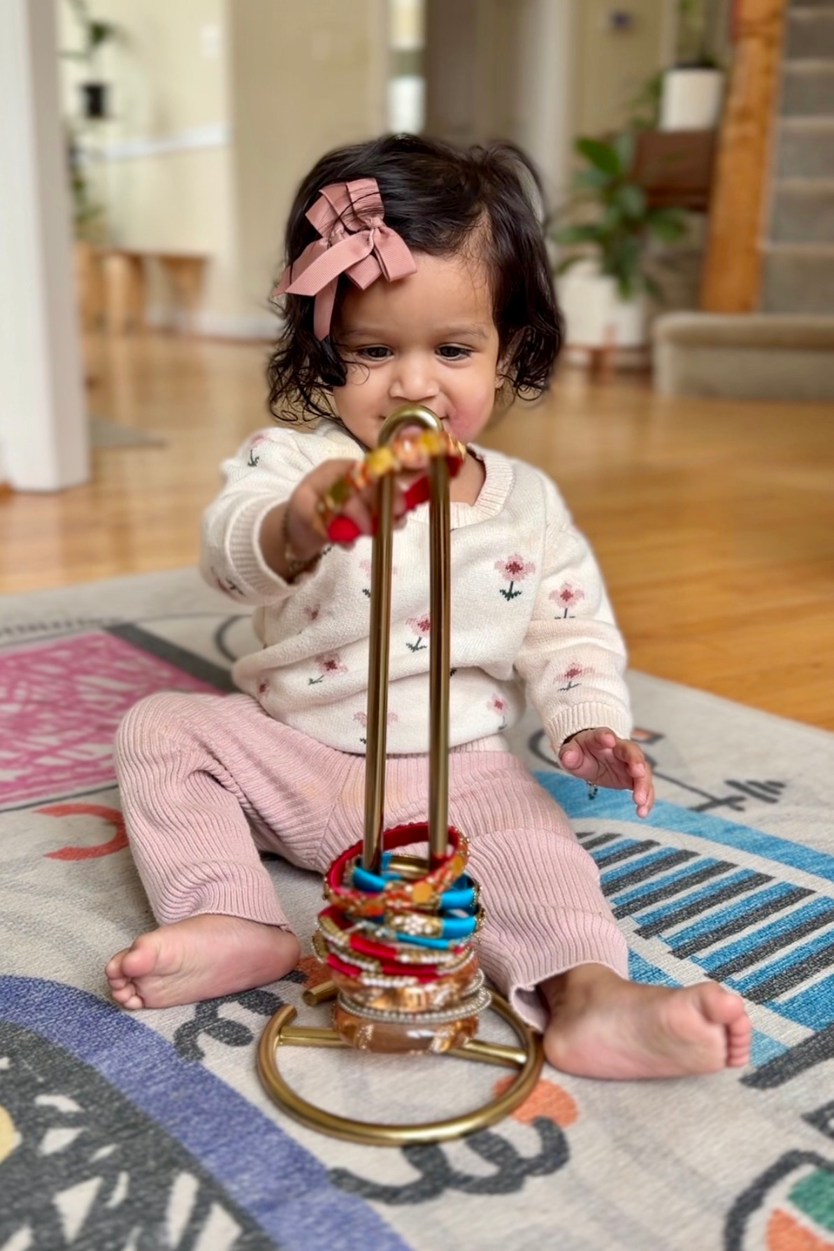 Amazing-Baby-Activities-6-12-Months-that-Boost-Development-through-play-towel-holder-baby-activity by Top US Mom Blogger Dreaming Loud