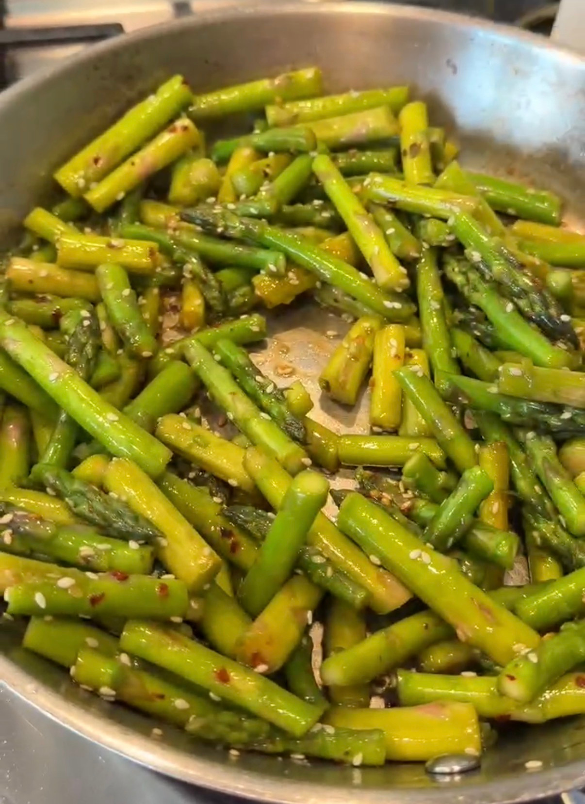 What My 1 Year Old Ate in a Day - Easy Indian Meals for Busy Moms (Week 1)- Sautéed Asparagus with Sesame & Chili Flakes recipe by Top US Mom Blogger Dreaming Loud
